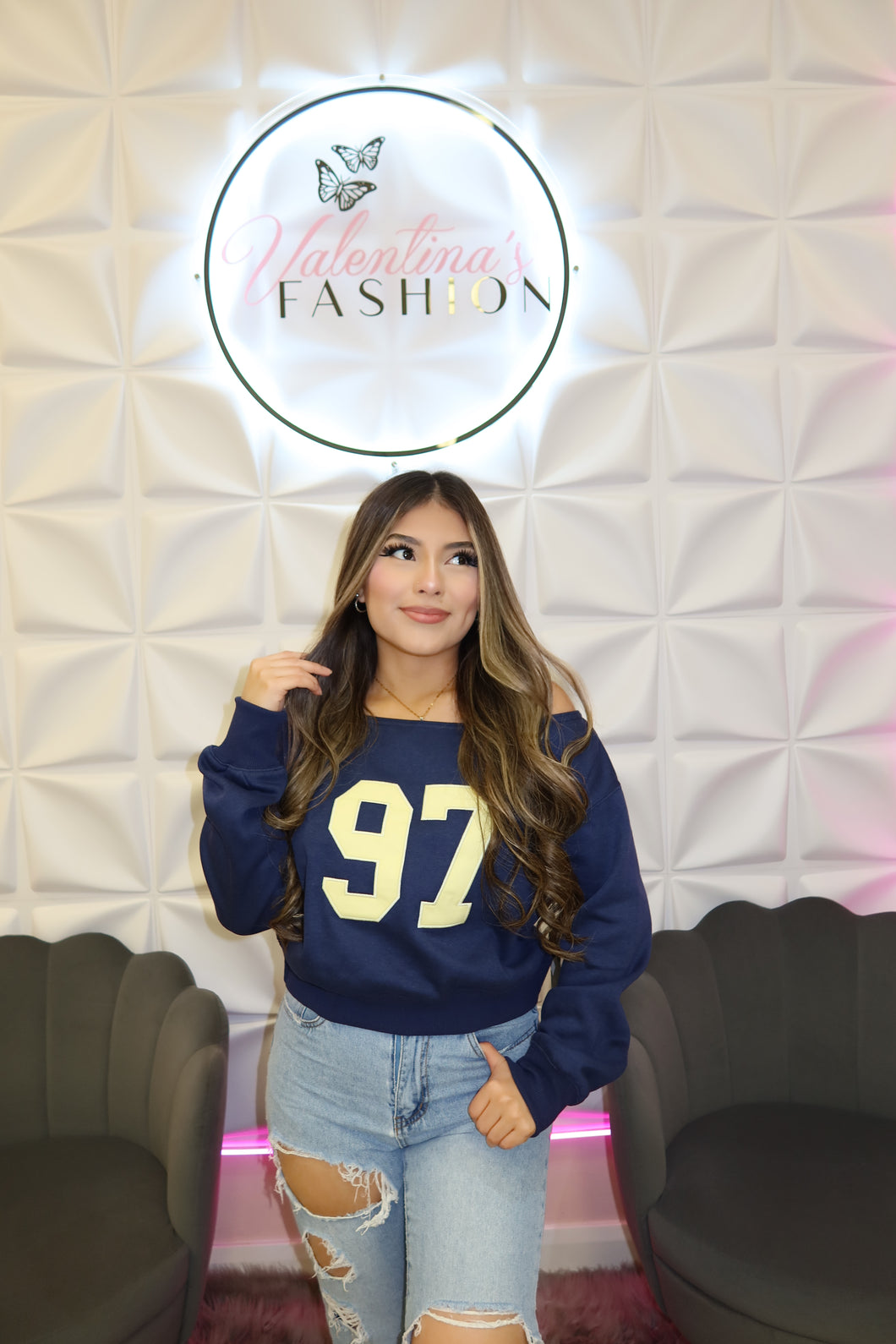 Off shoulder pull over sweater